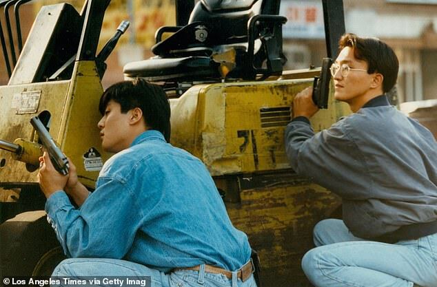 Rooftop Koreans, Image Courtesy of LA Times via Getty Images